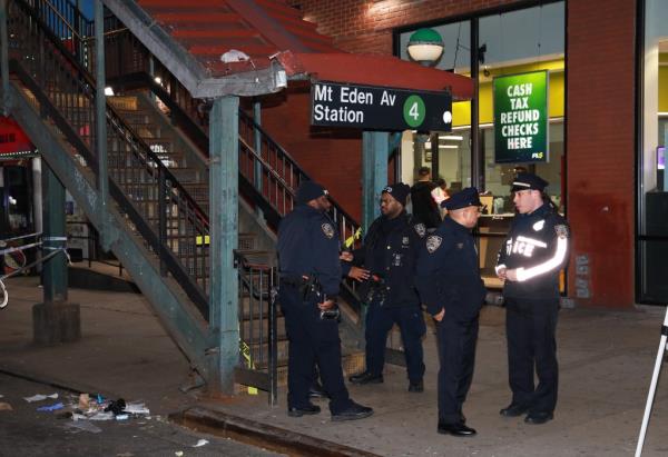 Police investigate a subway shooting. 