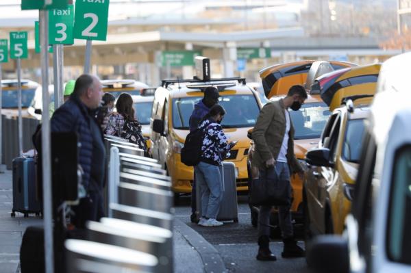 PEOPLE GETTING IN TAXIS